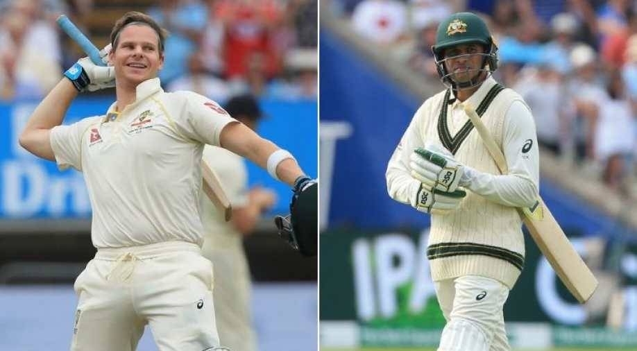 Steve Smith (L), Usman Khawaja (R). — AFP 