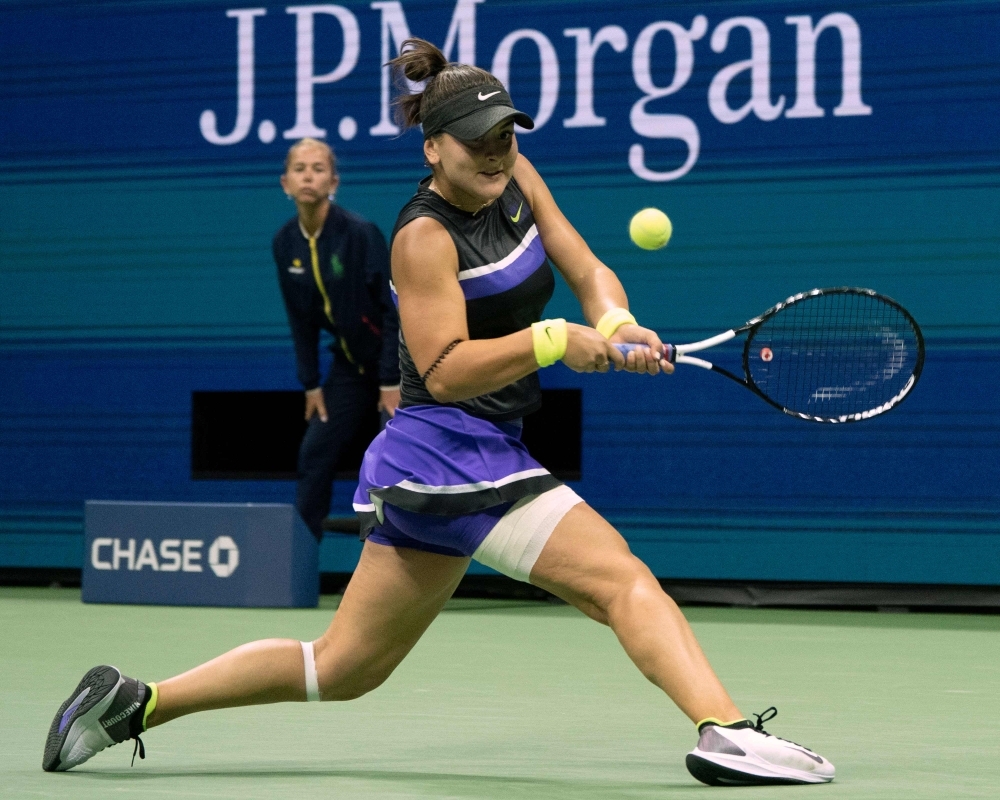 Bianca Andreescu of Canada hits a return to Taylor Townsend of the US during their Round Four Women's Singles match at the 2019 US Open at the USTA Billie Jean King National Tennis Center in New York, on Monday. — AFP