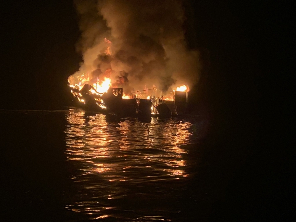 In this photo released by the Santa Barbara County Fire Department on Monday, a boat burns off the coast of Santa Cruz Island, California. — AFP