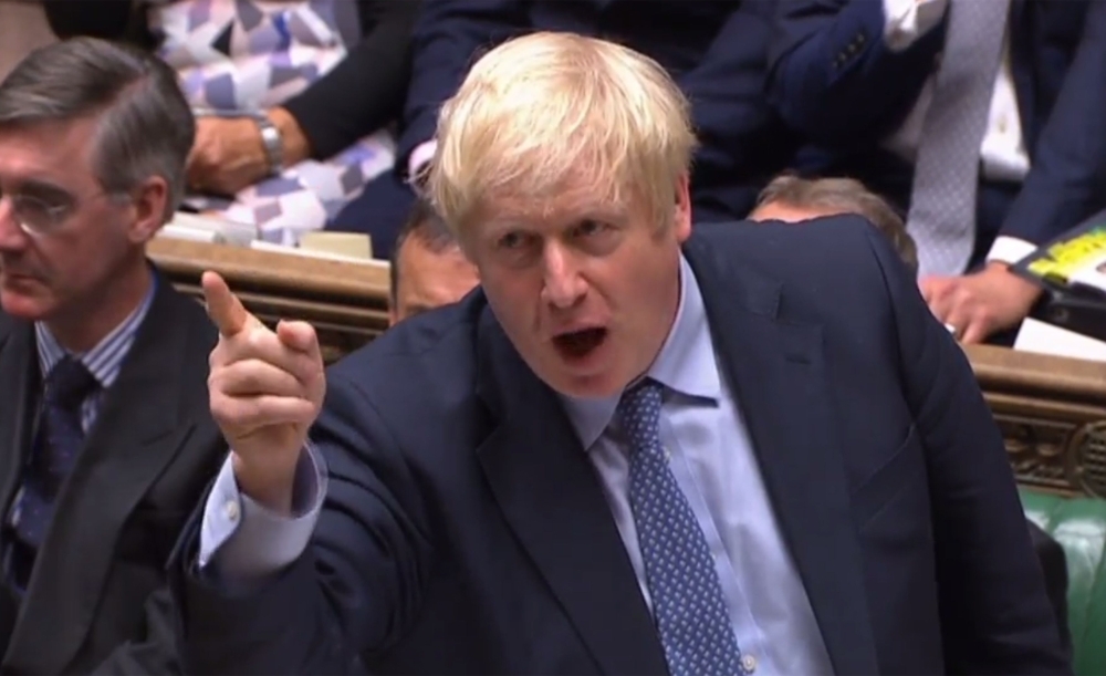 A video grab from footage broadcast by the UK Parliament's Parliamentary Recording Unit (PRU) shows Britain's Prime Minister Boris Johnson speaking during his first Prime Ministers Questions session in the House of Commons in London on Wednesday. — AFP