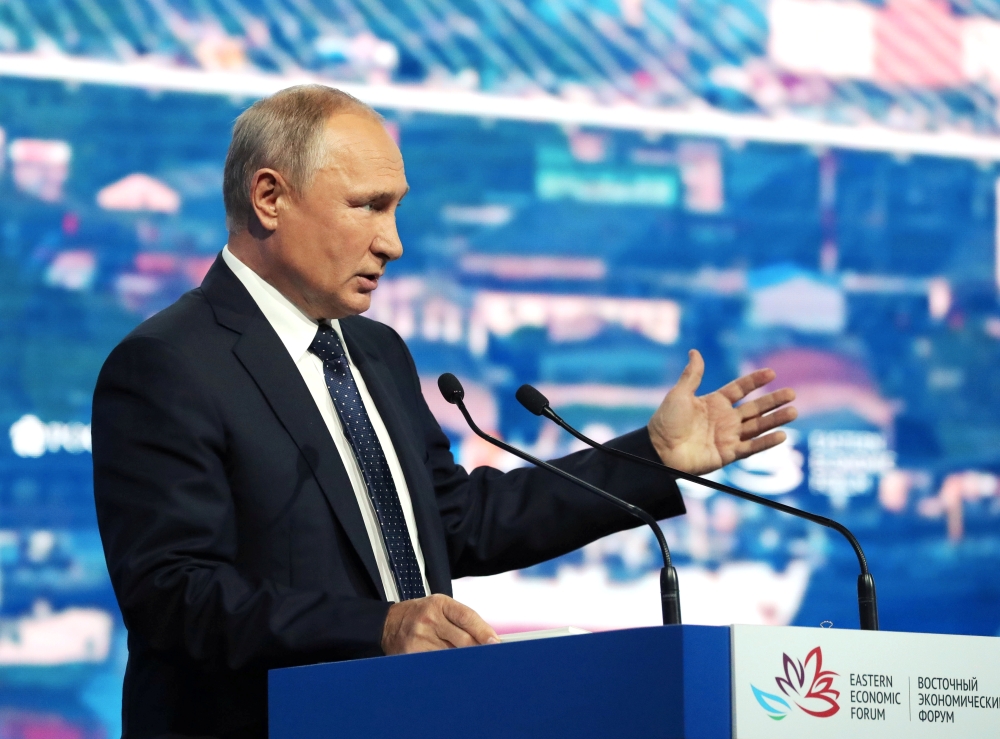 Russian President Vladimir Putin delivers a speech during a plenary session of the Eastern Economic Forum in Vladivostok, Russia, on Thursday. — Reuters