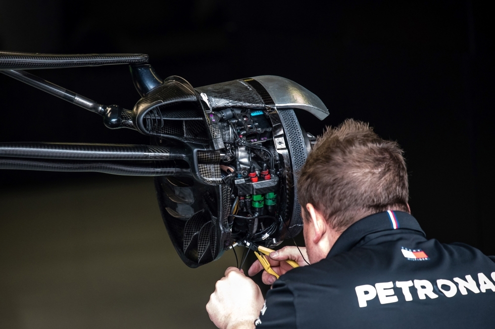 A mechanic works on the car of Mercedes' British driver Lewis Hamilton at the Autodromo Nazionale circuit in Monza on Thursday ahead of the Italian Formula One Grand Prix.
— AFP