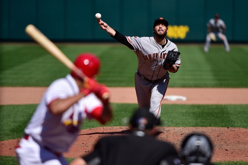 Kyle Barraclough No. 45 of the San Francisco Giants pitches to Yairo Munoz No. 34 of the St. Louis Cardinals during the eighth inning at Busch Stadium on Thursday in St Louis, Missouri.   — AFP