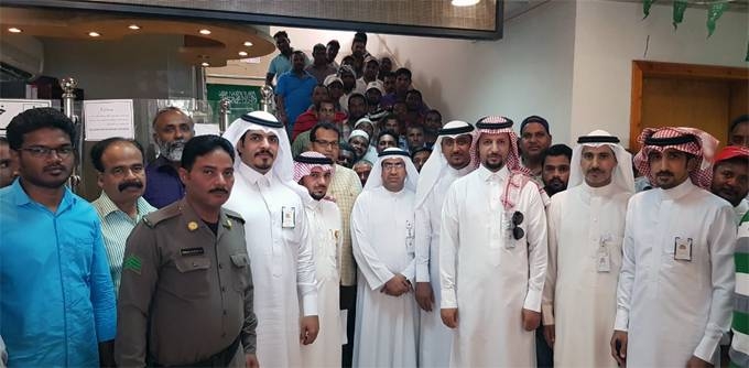 Members of the Labor Office in Al-Khobar governorate seen with the expat plaintiffs after the ruling.