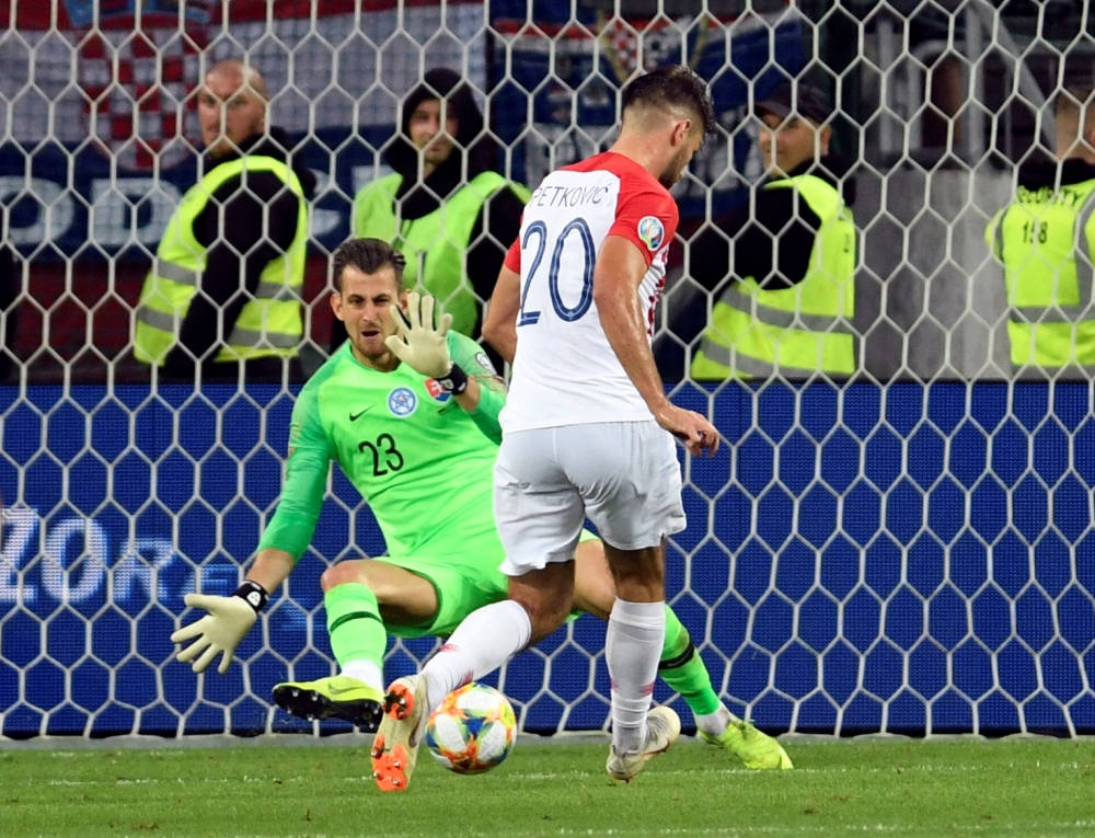 Croatia's Bruno Petkovic scores their third goal against Slovakia during Euro 2020 Qualifier Group E match at City Arena, Trnava, Slovakia, on Friday. — Reuters