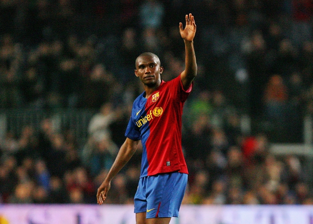 In this file photo taken on Nov. 8, 2008 Barcelona's Cameroonian Samuel Eto'o waves to his fans during their Liga football match against Valladolid at the New Camp stadium, in Barcelona. Barcelona won 6-0 with 4 goals from Samuel Eto'o. Cameroon's four-time African Player of the Year Samuel Eto'o announced his retirement on Saturday at the age of 38, declaring 
