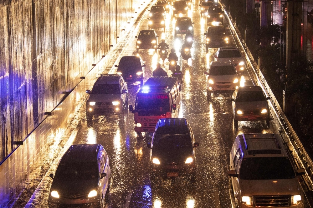 An ambulance negotiates through rush hour traffic along the EDSA highway in Manila in this Aug. 5, 2019 file photo. — AFP