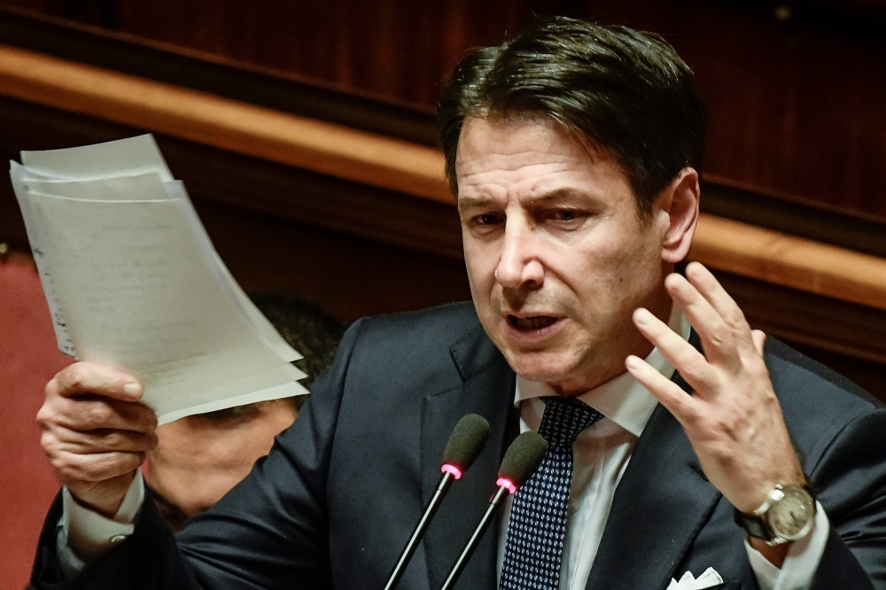 Italy's Prime Minister Giuseppe Conte gestures as he delivers a speech during the new government's confidence vote at the Senate in Rome on Tuesday. — AFP