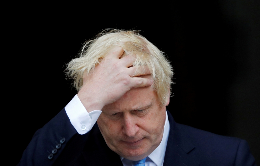 Britain's Prime Minister Boris Johnson gestures as he meets Ireland's Prime Minister (Taoiseach) Leo Varadkar, not pictured, in Dublin, Ireland, in this Sept. 9, 2019 file photo. — Reuters