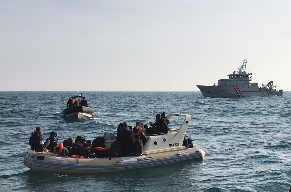 British rescuers, front help some 20 migrants on a semi-rigid boat trying make their way from France across the English Channel in this Feb. 18, 2019 file photo. — AFP