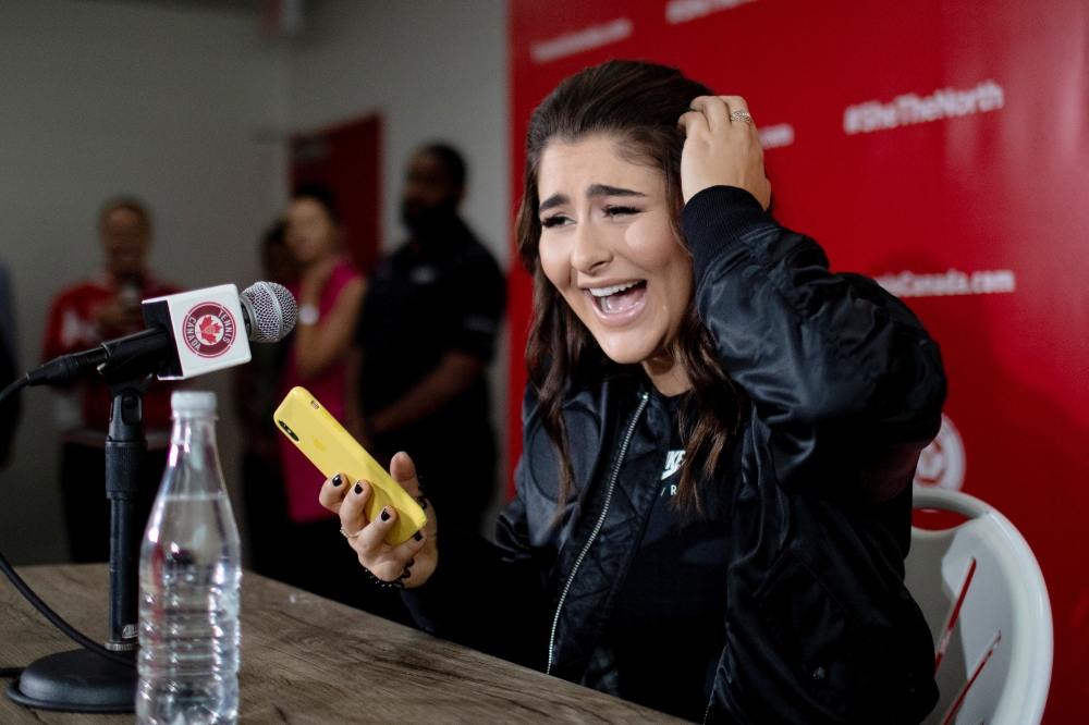 Canadian tennis player Bianca Andreescu speaks with the news media about her win at the US Open, after arriving in Toronto, Ontario, Canada on Wednesday. — Reuters