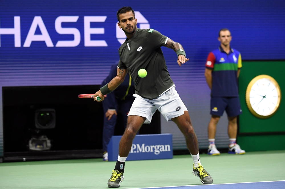 Sumit Nagal of India hits to Roger Federer of Switzerland in the first round on day one of the 2019 US Open tennis tournament at USTA Billie Jean King National Tennis Center. — Reuters