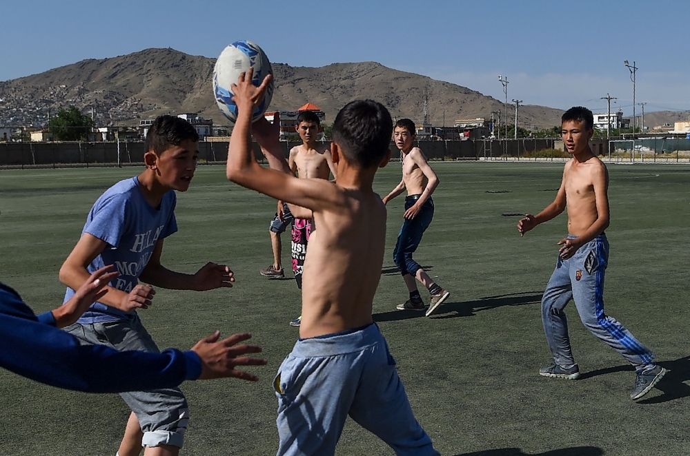 In this photo taken on June 13, 2019, young rugby players stand in line after a practice session on a pitch in Kabul. Essentially unheard of before the arrival of international forces, the sport of rugby has slowly begun to pick up steam in Afghanistan, where football, cricket and body-building are better known. — AFP