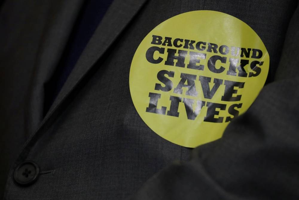 A member of the US Congress wears a 'Background Checks Save Lives' sticker during a news conference announcing the introduction of 'bipartisan legislation to expand background checks for sales and transfers of firearms' on Capitol Hill in Washington, in this Jan. 8, 2019 file photo. — Reuters