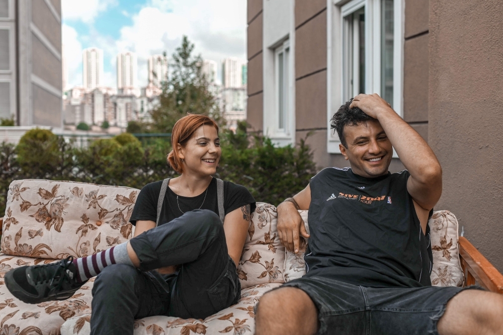 Turkish musician Deniz Tekin, left and rap singer Samet Gonullu, right, whose stage name is Sokrat St, attend an interview in Istanbul, Turkey, in this Sept. 10, 2019 file photo. — AFP