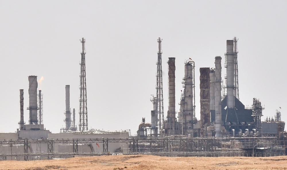 A picture taken on Sunday shows an Aramco oil facility near Al-Khurj area, just south of the Saudi capital Riyadh. Saudi Arabia raced today to restart operations at oil plants hit by drone attacks which slashed its production by half. — AFP