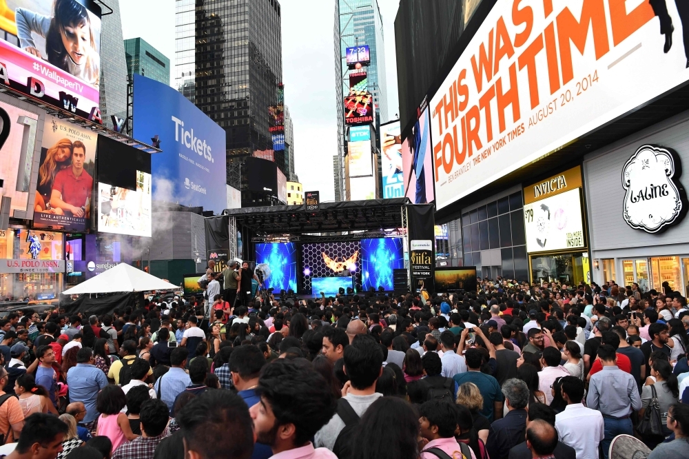 In this file photo taken on July 14, 2017 fans wait to watch Bollywood movie stars during IIFA Stomp in the Times Square to kick off the 18th International Indian Film Academy (IIFA) Festival in New York. -AFP