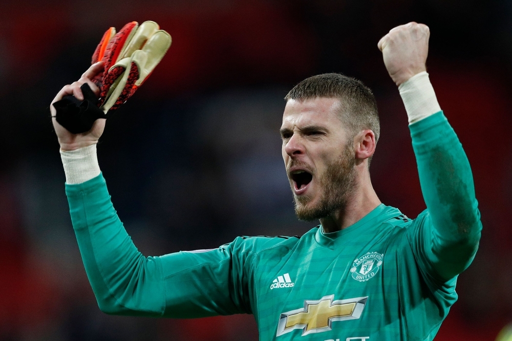 Manchester United's Spanish goalkeeper David de Gea has signed a new long-term contract with Manchester United, the Premier League club announced on Monday, ending months of speculation over his future. — AFP