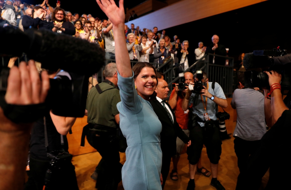 Leader of Britain's Liberal Democrats Jo Swinson leaves after she delivered her speech at the yearly party conference in Bournemouth, Britain, on Tuesday. — Reuters