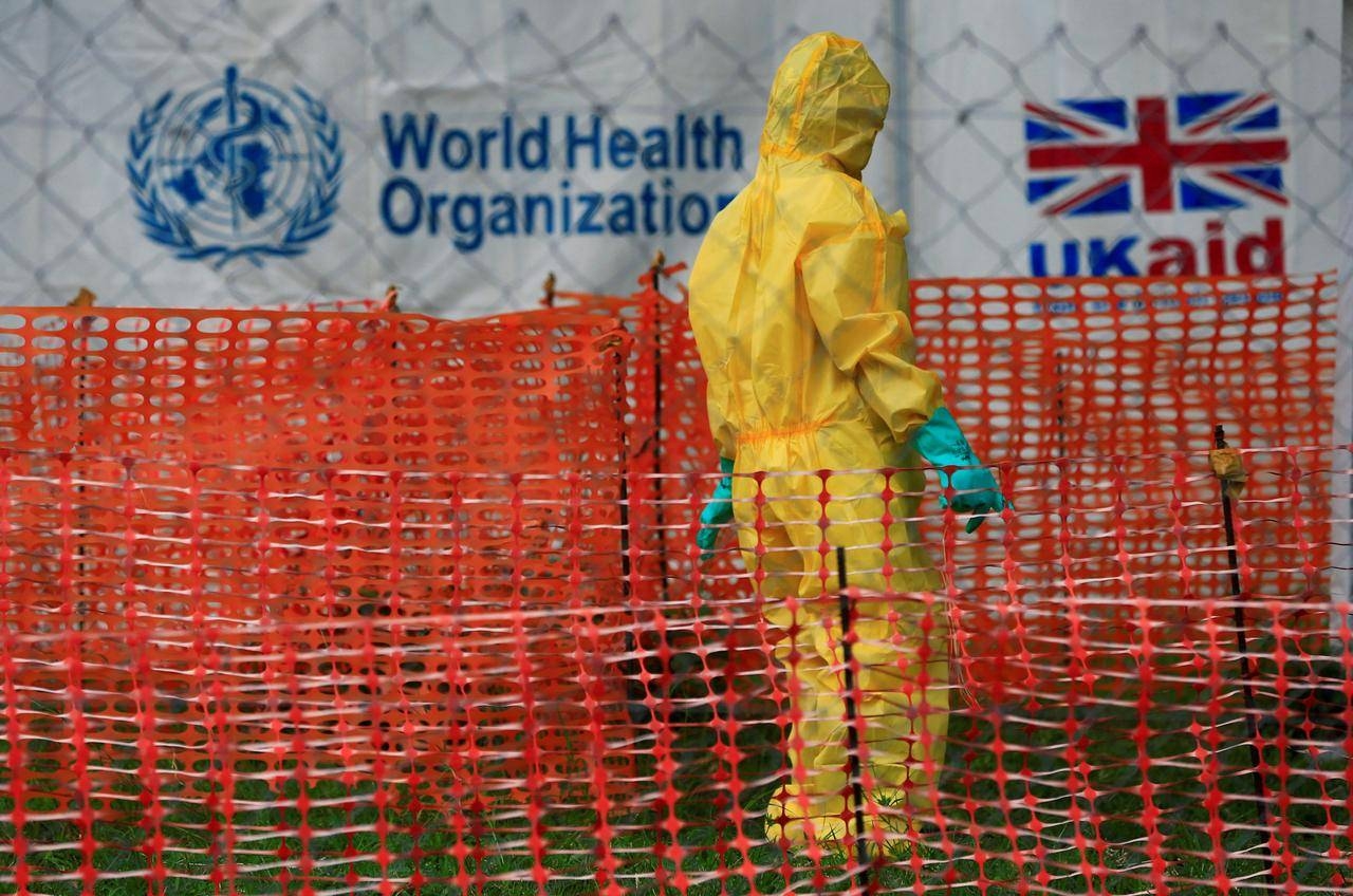 A person dressed in Ebola protective apparel is seen inside an Ebola care facility at the Bwera general hospital near the border with the Democratic Republic of Congo in Bwera, Uganda, June 14, 2019. -Reuters