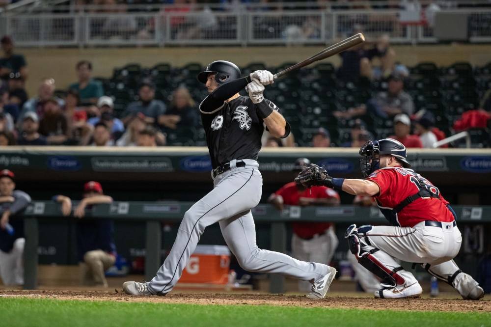 Chicago White Sox right fielder Ryan Cordell (49) hits a two-run home run during the 12th inning against the Minnesota Twins at Target Field, Minneapolis, MN, USA, on Tuesday. — Reuters