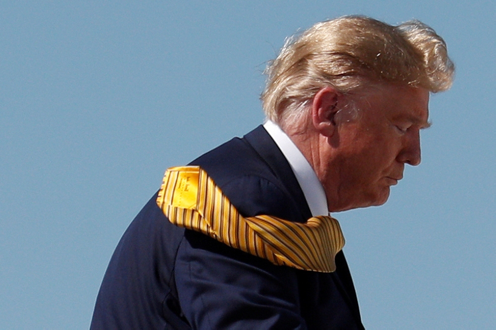 US President Donald Trump boards Air Force One at Moffett Federal Airfield in Mountain View, California, on Tuesday. — Reuters