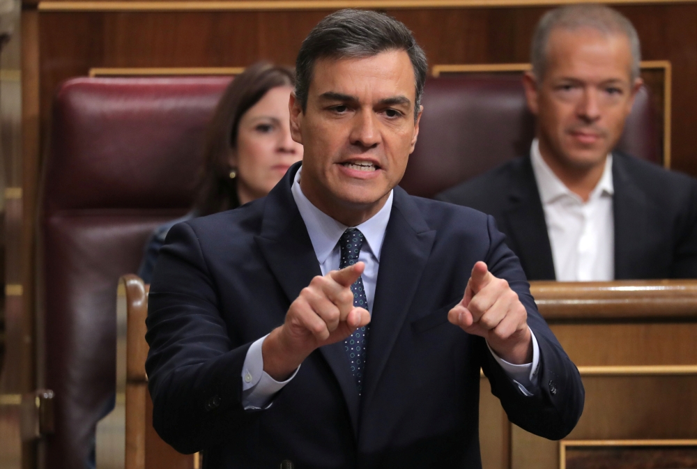 Spain's acting Prime Minister Pedro Sanchez attends weekly Cabinet control session at Parliament in Madrid on Wednesday. — Reuters