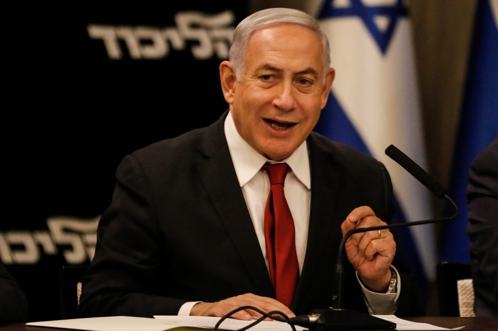 Israeli Prime Minister Benjamin Netanyahu speaks during his Likud party meeting in Jerusalem on Wednesday. — AFP