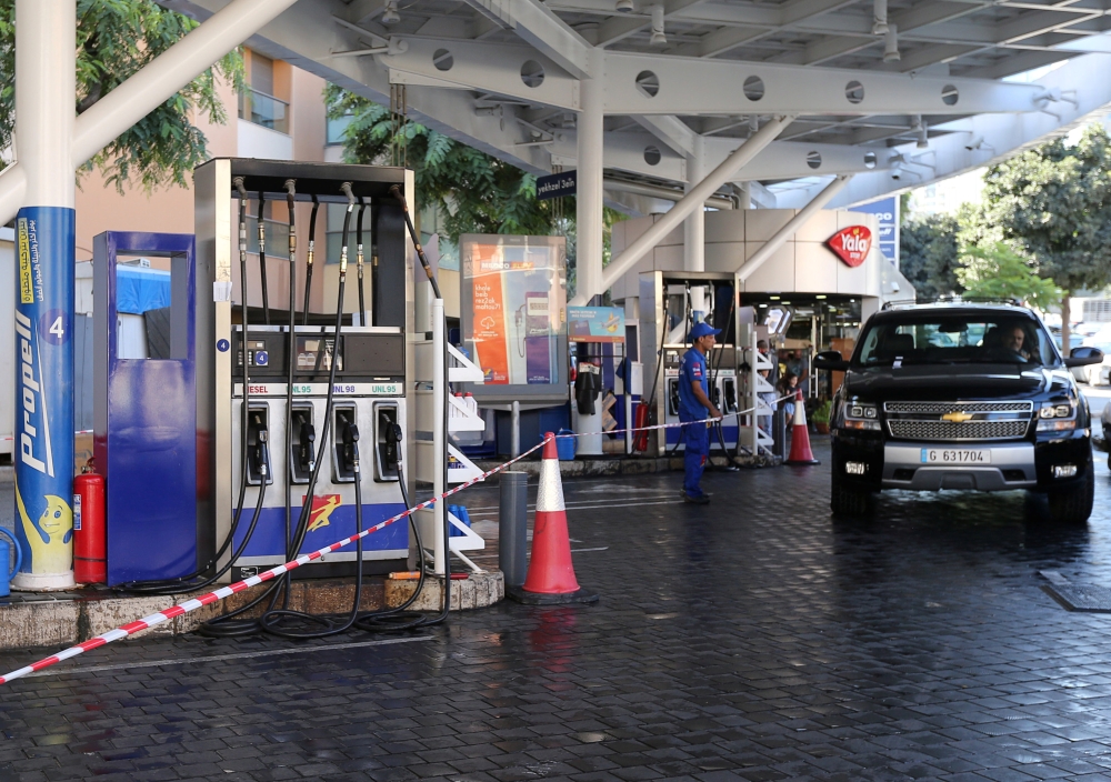 A gas station closes during a protest againt tight supply of dollars in Beirut, Lebanon, on Wednesday. — Reuters
