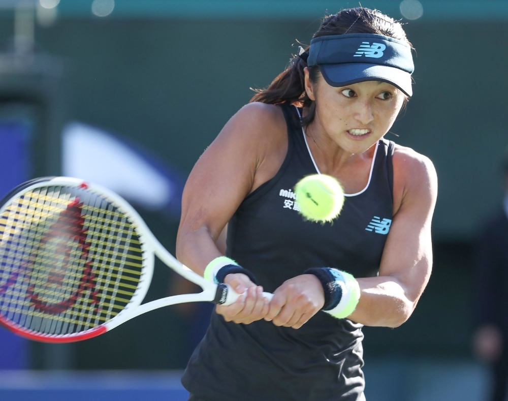 Japan's Misaki Doi hits a return against Croatia's Donna Vekic in the women's singles second round at the Pan Pacific Open tennis tournament in Osaka on Thursday. — AFP