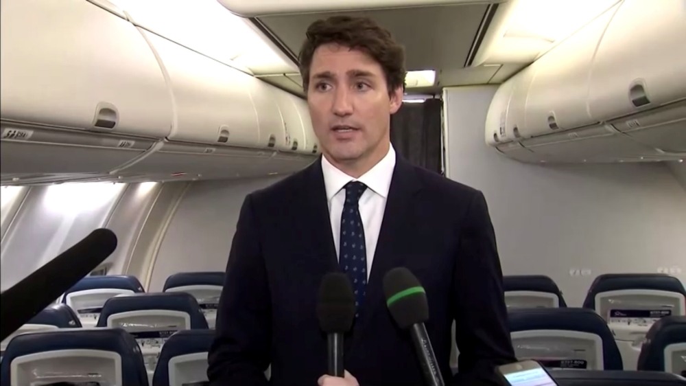 Canada’s Prime Minister Justin Trudeau apologizes for wearing brownface makeup in 2001, to reporters on the Liberal party leader’s election campaign jet in Halifax, Nova Scotia, Canada in a still image from video Wednesday.  — Reuters