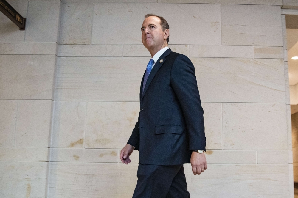 Permanent Select Committee on Intelligence Chairman Adam Schiff (D-CA) arrives at the Capitol before the committee meeting with Acting Director of National Intelligence Joseph Maguire on Thursday in Washington, DC. Acting Director Maguire is set to meet with members of the House Intelligence Committee over a recent whistleblower complaint against President Donald Trump by an intel analyst.  — AFP