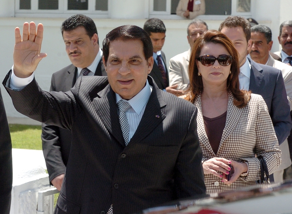 In this file photo taken on May 9, 2010, former Tunisian President Zine El Abidine Ben Ali (front) waves to wellwishers after voting for the municipal elections next to his wife Leila (C) and his son-in-law the Tunisian businessman Sakhr Materi (R). Tunisia's all-powerful leader for two decades died Thursday aged 83, Tunisia's Foreign Ministry said. — AFP