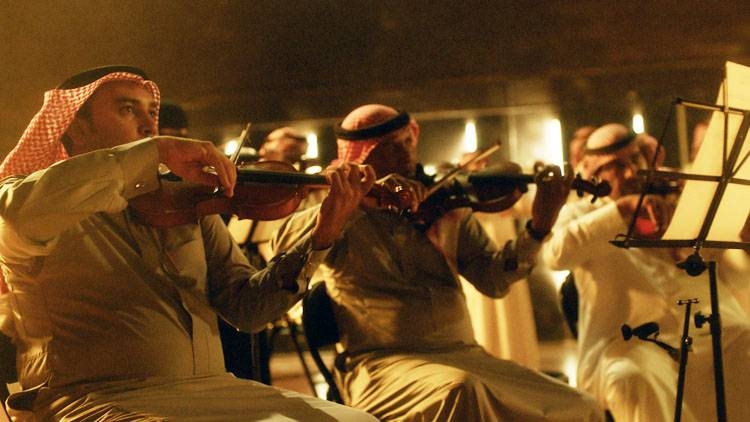 A Saudi Orchestra performed the Saudi National Anthem in a touching way.