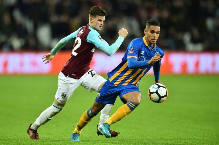 Derby's Max Lowe (R, pictured Jan. 2019) scored a 20th-minute own goal during the match against Leeds. — AFP
