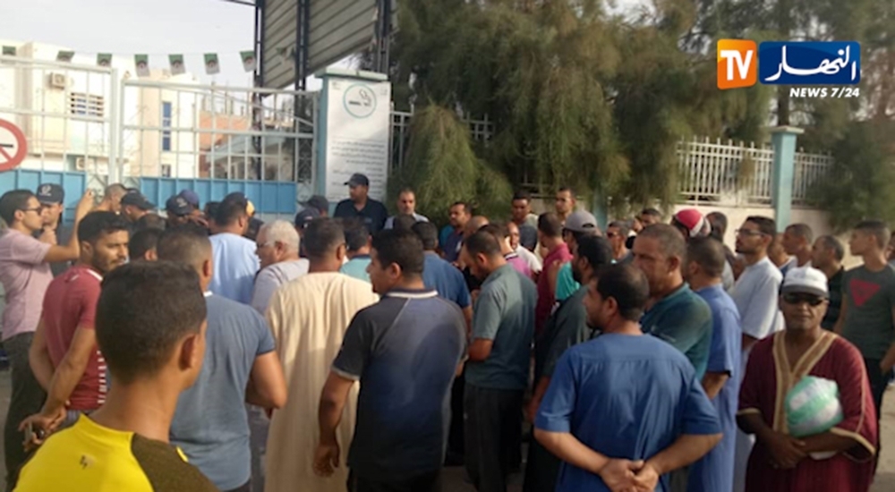 An image grab from footage from Algeria's Ennnahar TV shows people standing on Tuesday outside the maternity unit of a hospital in Oued Souf, 500 km southeast of Algiers after a fire ripped through it overnight killing eight babies. — AFP