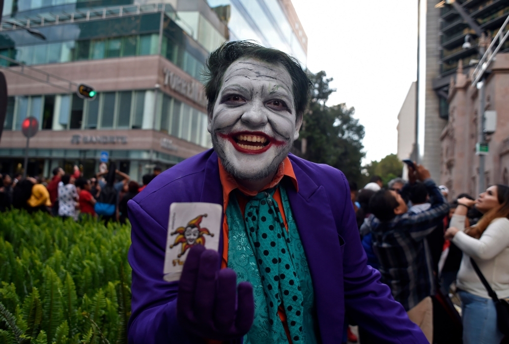 A man disguised as villain Joker on the 80th anniversary of US comics fictional superhero Batman, in Mexico City, in this Sept. 21, 2019 file photo. — AFP