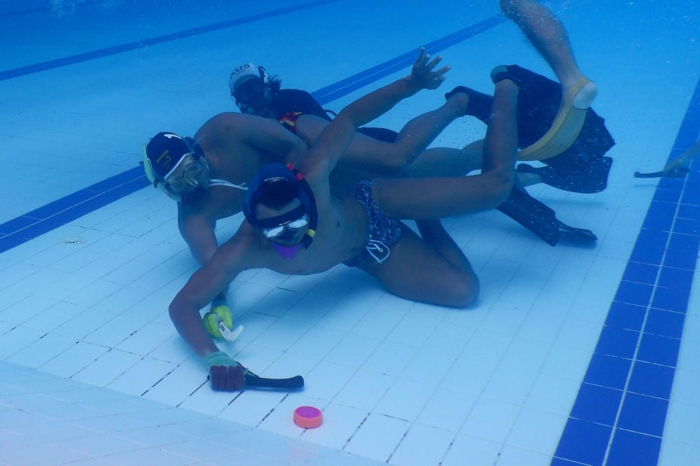 This picture shows members of Indonesia's women's underwater hockey team during a training session at the Senayan Aquatic Center in Jakarta ahead of the Southeast Asian (SEA) Games in the Philippines later this year. Invented in the 1950s in Britain — where it is known as 