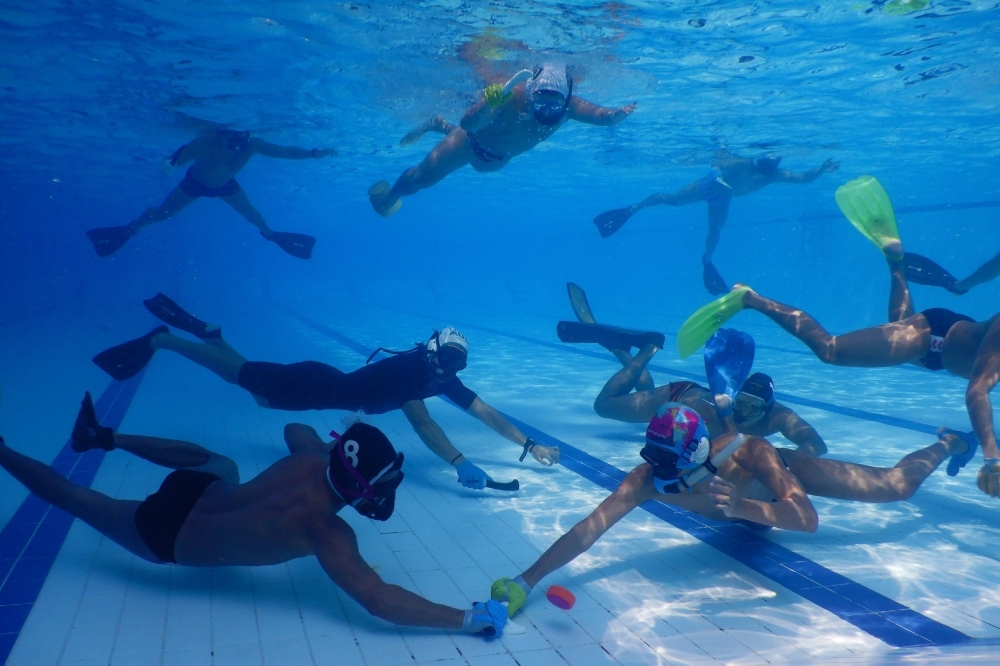 This picture shows members of Indonesia's women's underwater hockey team during a training session at the Senayan Aquatic Center in Jakarta ahead of the Southeast Asian (SEA) Games in the Philippines later this year. Invented in the 1950s in Britain — where it is known as 