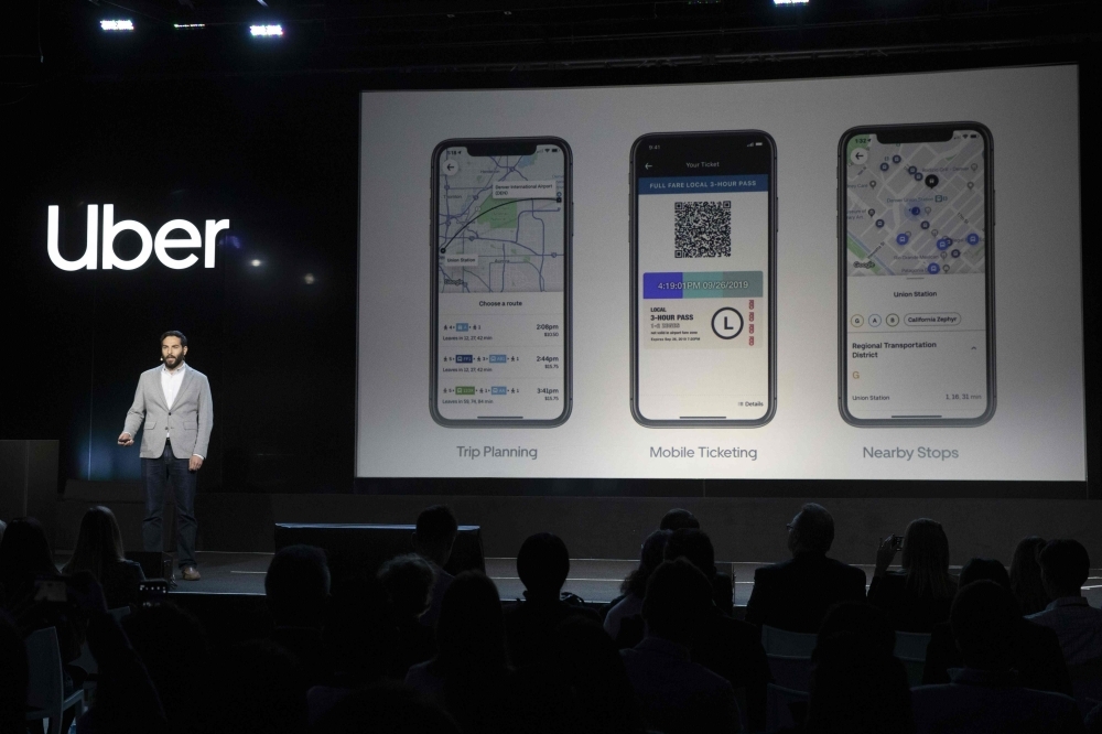 Uber Incubator — Head of Strategy Karishma Shah addresses the audience during an Uber products launch event in San Francisco, California, on Thursday. Uber unveiled a new version of its smartphone app that weaves together services from shared rides to public transit schedules while adding more security features. — AFP