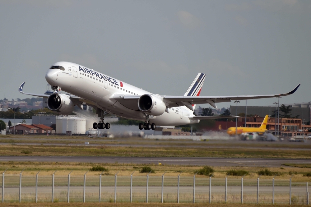 A new Airbus A 350 of Air France is pictured during its first flight at the Airbus delivery center, in Colomiers, southwestern France, on Friday. — AFP