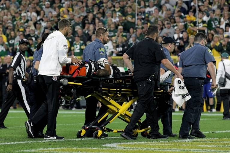 Two Eagles players stretchered off field after neck injuries