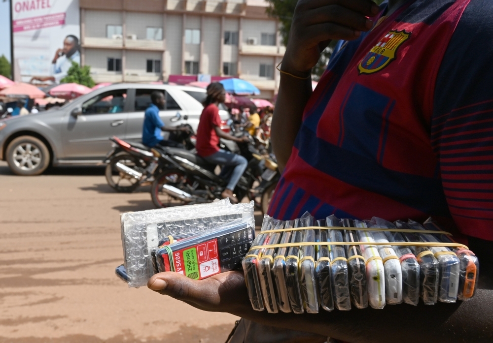 A man sells phone at the mobile phone market in Ouagadougou, on Sept. 23, 2019. Seventeen people, including a soldier, were killed in weekend attacks in the north of Burkina Faso, security sources said on Sunday. — AFP