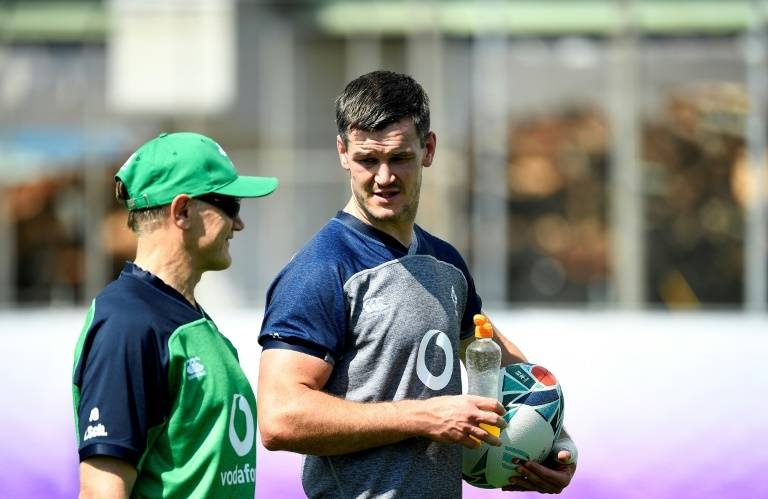 Ireland coach Joe Schmidt (L) named Jonathan Sexton as captain of his team to face Russia. — AFP