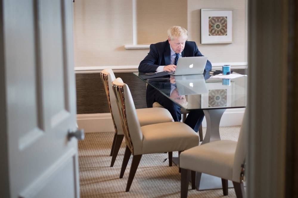 Britain's Prime Minister Boris Johnson prepares his keynote speech for the annual Conservative Party conference in Manchester, northwest England, on October 1, 2019. — AFP