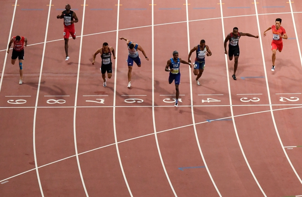 USA's Noah Lyles celebrates taking gold in the Men's 200m final at the 2019 IAAF Athletics World Championships at the Khalifa International stadium in Doha, on Tuesday. — AFP