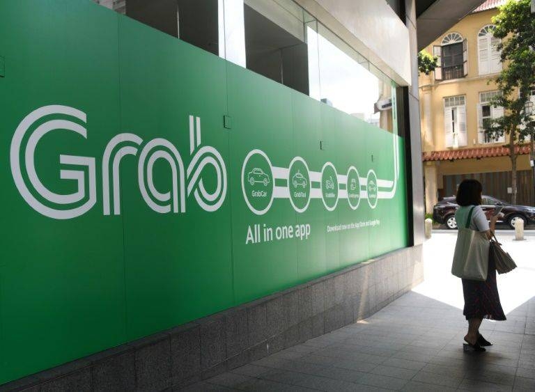 Grab faces a $21 million in Malaysia for alleged anti-competition practices. — AFP