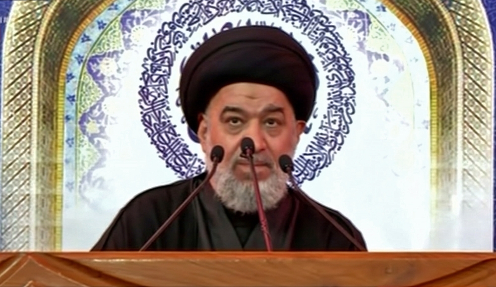 An image grab taken from Iraqiya state TV channel shows Ahmad Al-Safi, a representative of Iraq's Shiite spiritual leader, reading a statement in which Grand Ayatollah Ali Sistani urged Iraq to heed protesters 'before it's too late' during a televised speech following the weekly Friday prayer at a mosque in the central shrine city of Karbala on Friday. — AFP