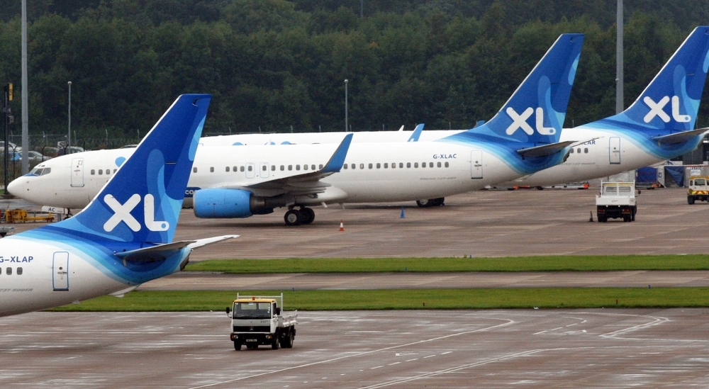 Aircraft from Britain's third largest tour operator, XL Leisure Group, which operates XL Airways are seen parked on the tarmac at Manchester Airport in Manchester, north-west England, in this Sept. 12, 2008 file photo. — AFP