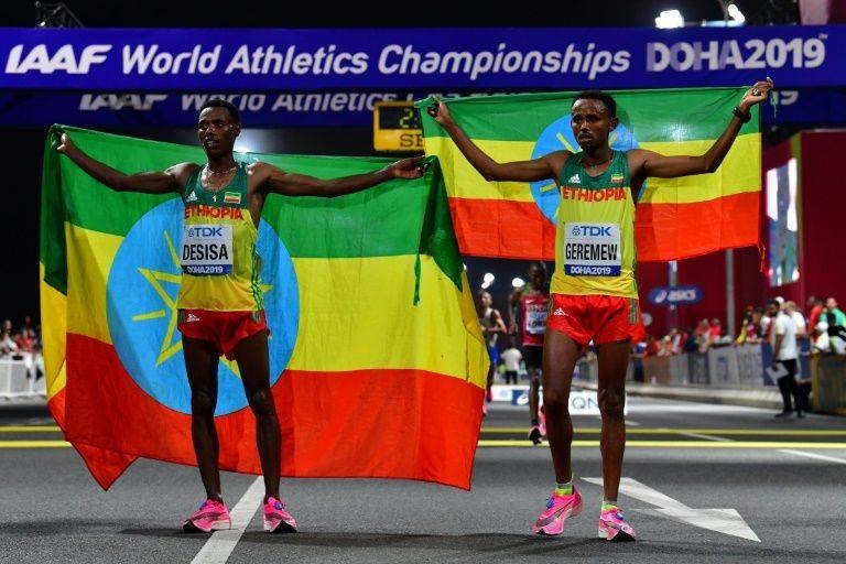 Dozens of African running fans lined Doha's seafront to glimpse their countrymen vie for gold in the World Athletics Championships men's marathon, singing loudly and brandishing national flags. — Courtesy photo